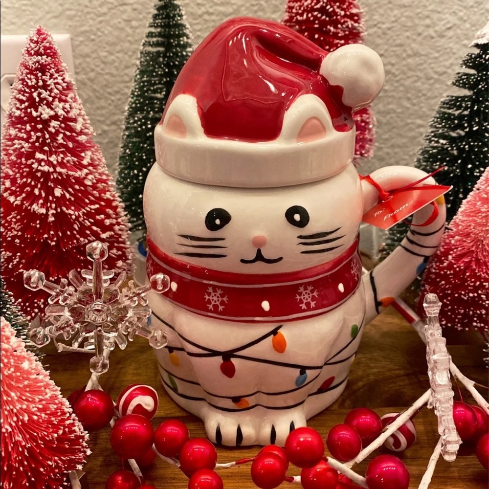 White Kitty Cat tangled in Christmas lights mug with Santa hat topper by Lang